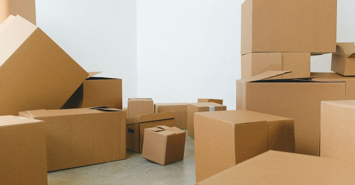 pile-of-cardboard-boxes-scattered-on-floor-247-self-storage-self-storage