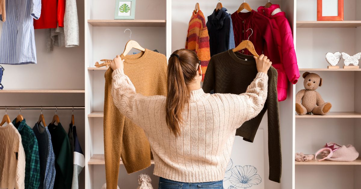 woman swapping out wardrobe for fall - 247 Self Storage self storage