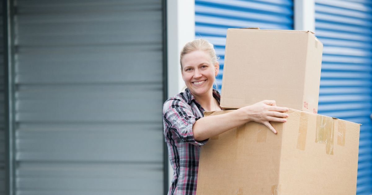 woman moving boxes at a self storage facility - 247 Self Storage Princeton Self Storage