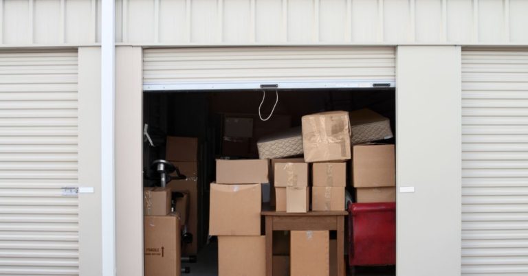 self storage facility unit full of cardboard boxes - 247 Self Storage Self Storage