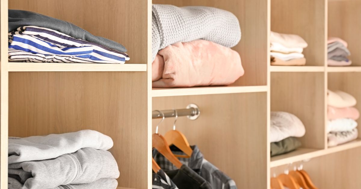 organized closet with minimal clothes - 247 Self Storage Self Storage