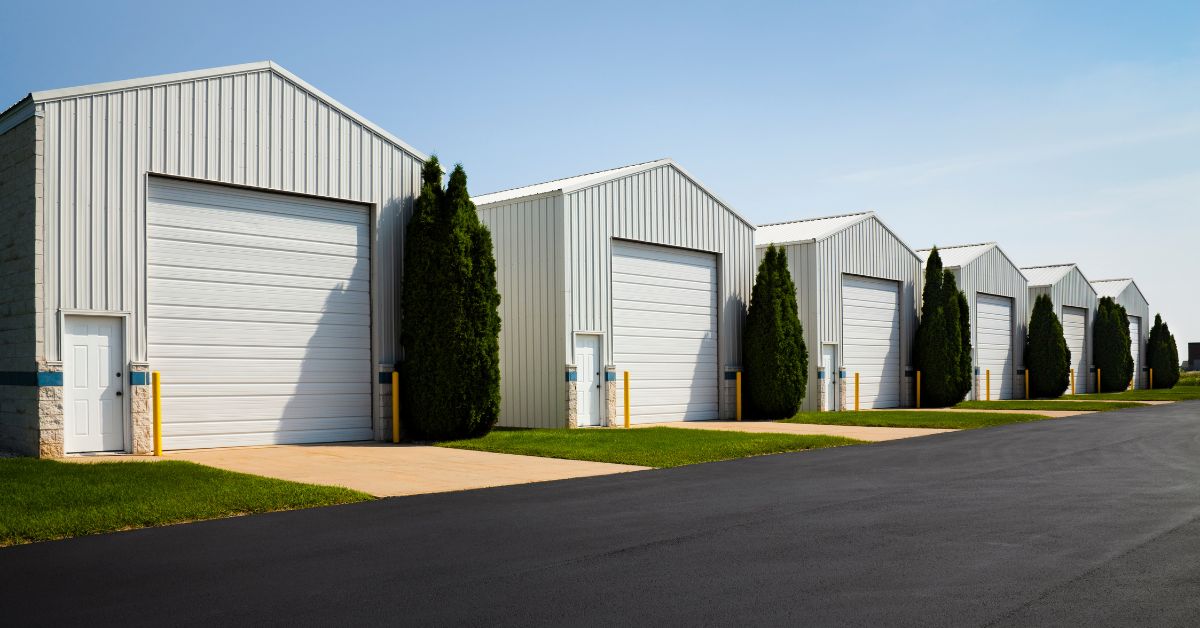 large self storage buildings with white doors - 247 Self Storage RV Storage Solutions